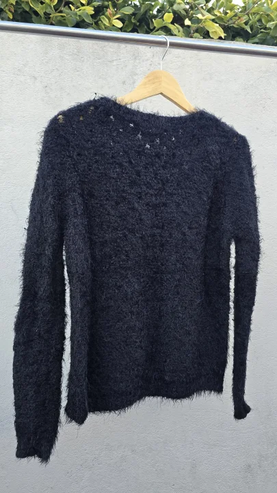 Sweater peludito calado