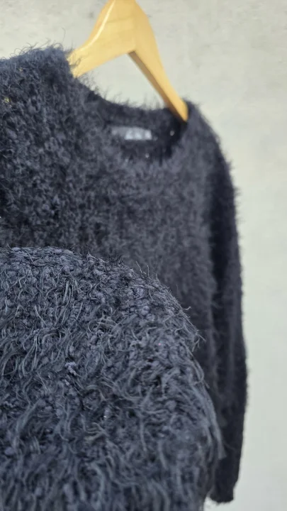 Sweater peludito calado